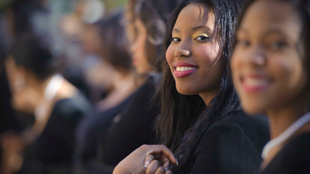 Female student smiling at camera